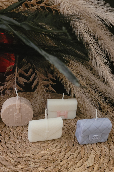 candele artigianali a forma di borse di lusso